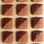 three rows of chocolate dipped shortbread cookies