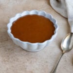 Salted caramel sauce in a white ceramic bowl