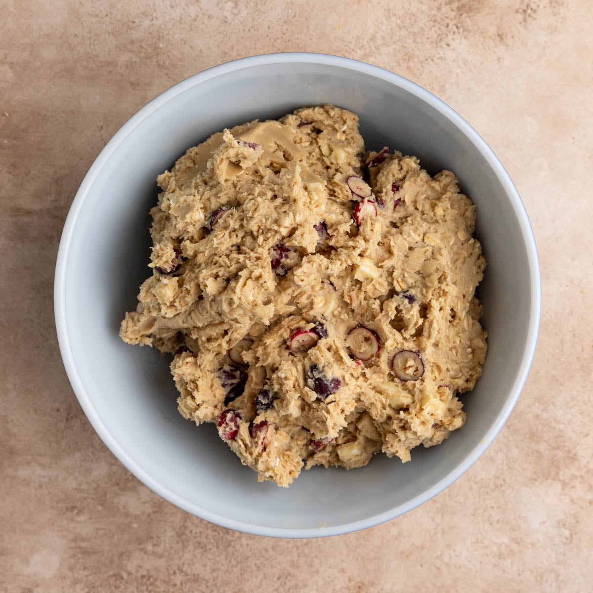 The cookie dough in a ceramic bowl
