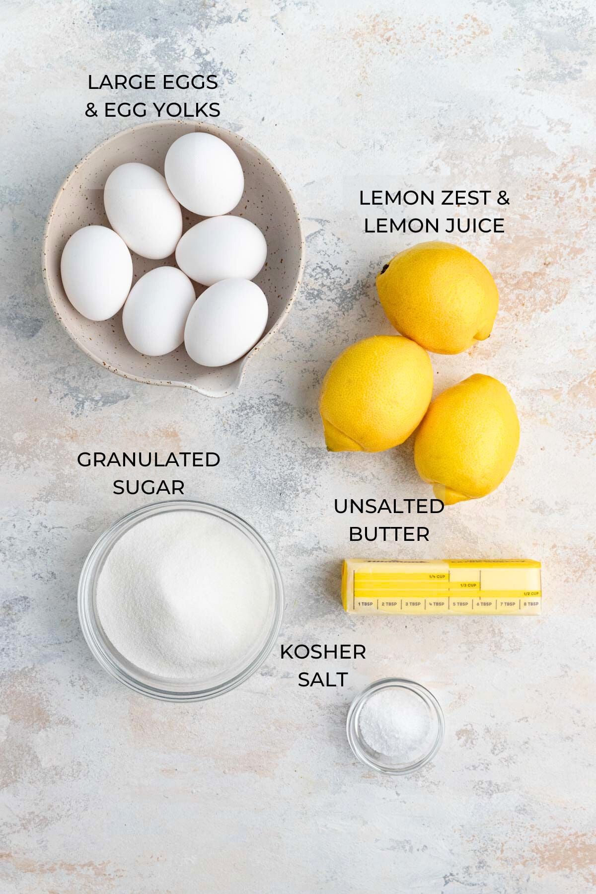 Lemon curd ingredients - large eggs, lemons, unsalted butter, kosher salt, and sugar