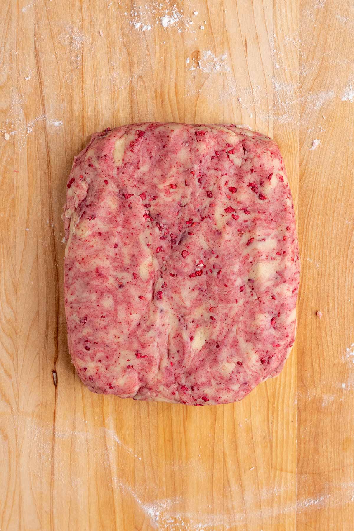 Raspberry shortbread cookie dough shaped into a rectangle