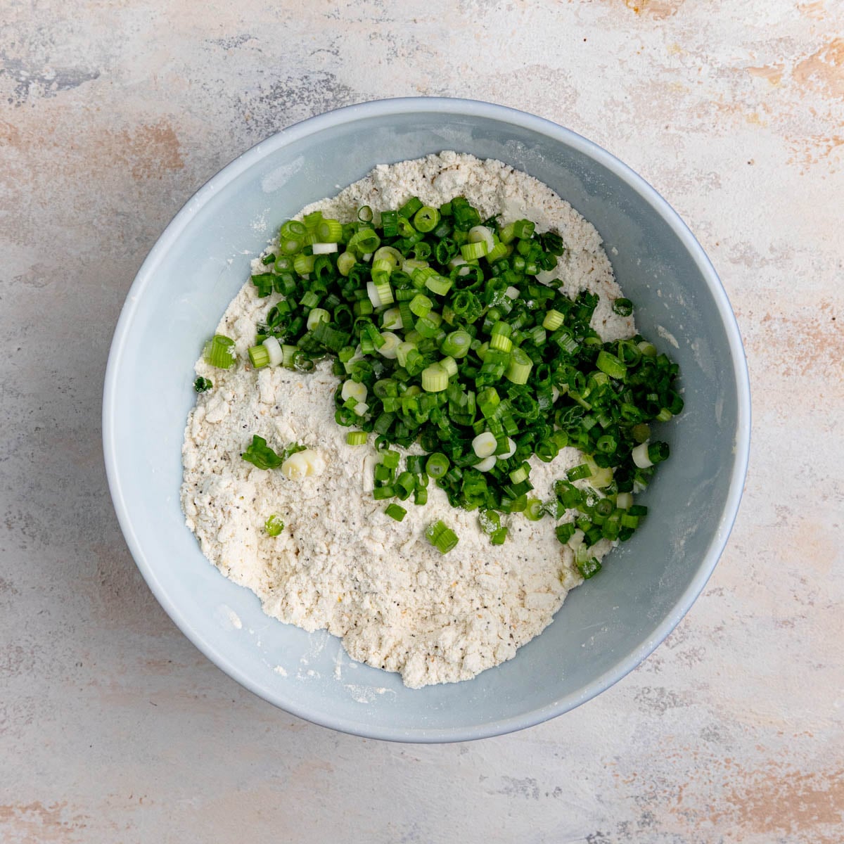 Thinly sliced fresh green onions added to the flour mixture and butter combination