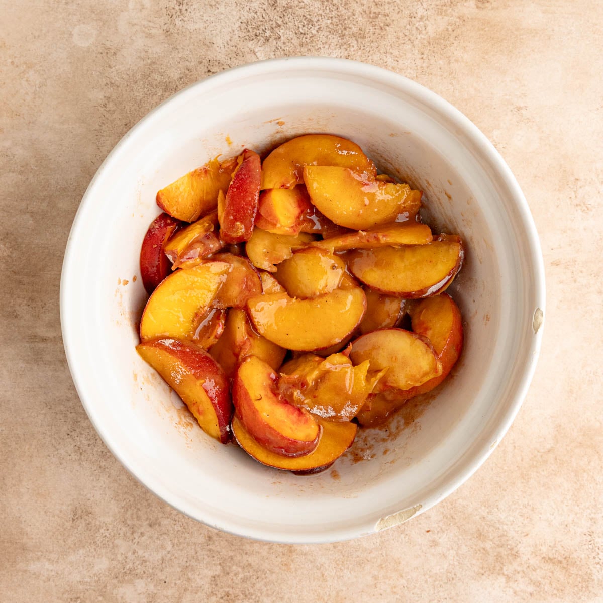 Fresh peaches combined with a mixture of sugar, cinnamon, nutmeg, and tapioca flour.
