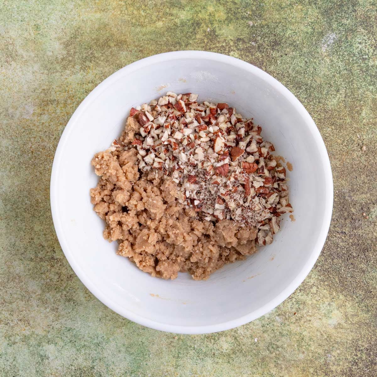 Streusel ingredients with chopped pecans added.