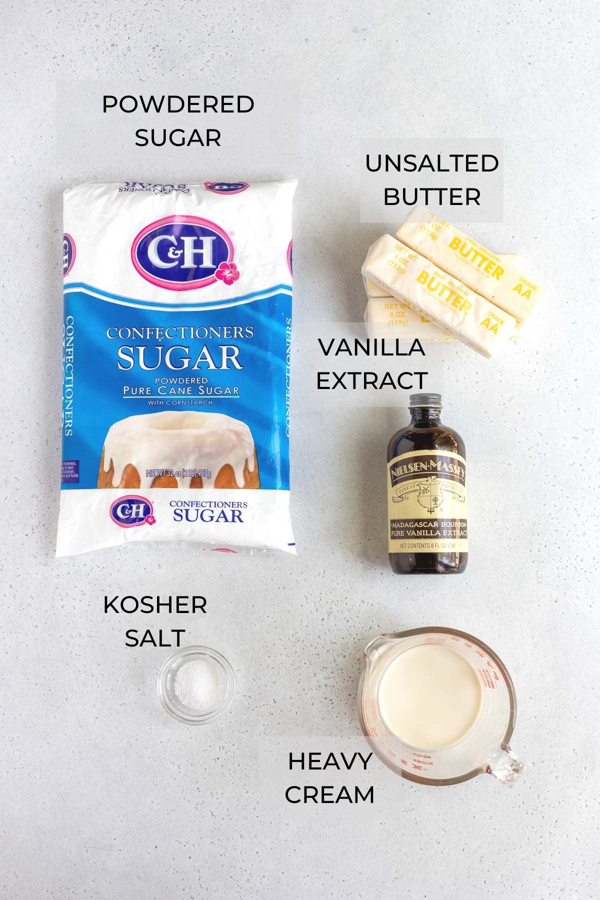 Vanilla buttercream ingredients - confectioners; sugar, unsalted butter, vanilla extract, heavy cream, kosher salt